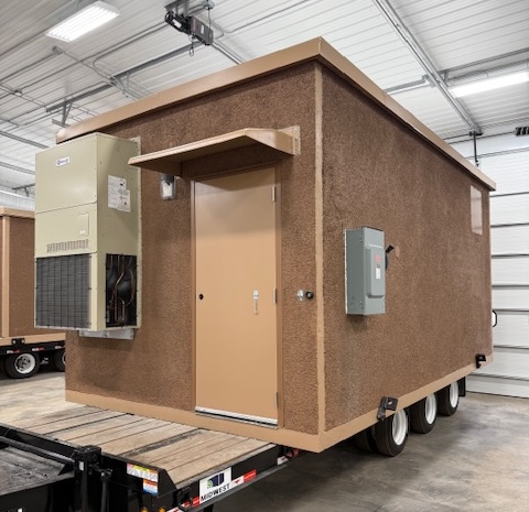 Newly refurbished 11 x 20 concrete communication building for sale